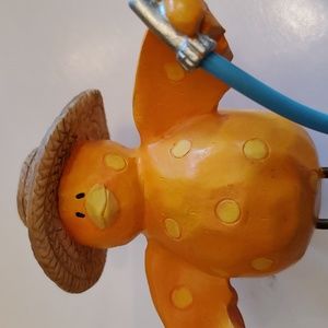 Bird watering the flowers